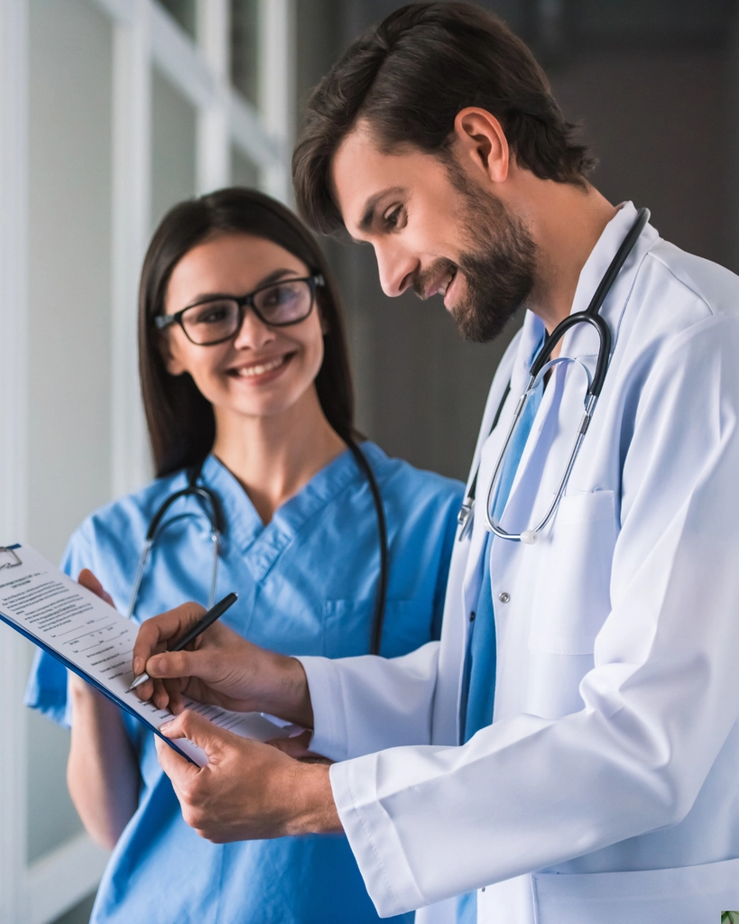 Doctors checking patient progress